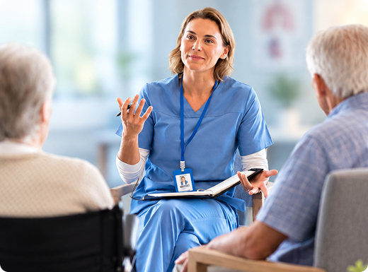 Doctor speaking with patients at Bloom Health